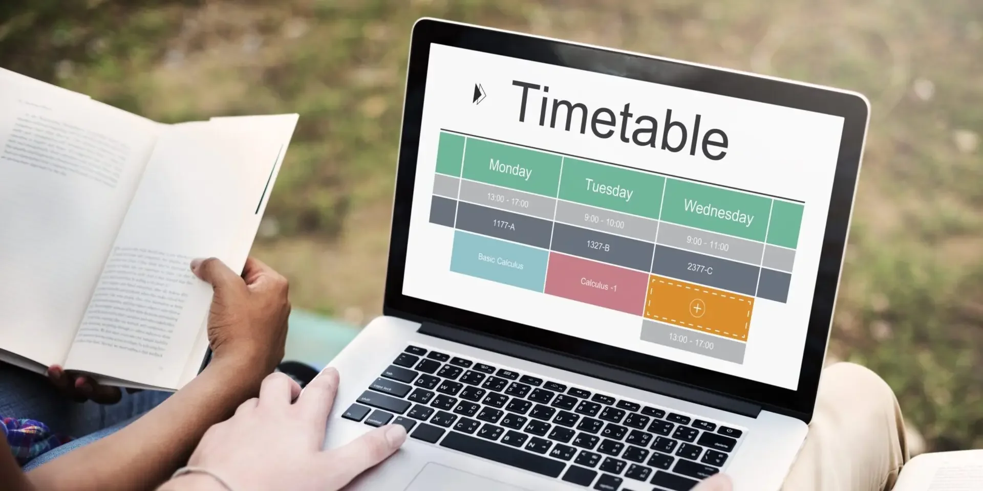 University students reviewing academic calendar dates on campus